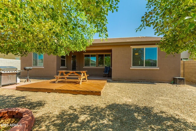 5218 W Lydia Ln, Laveen, AZ 85339 - back of house with fence, a deck, and stucco siding