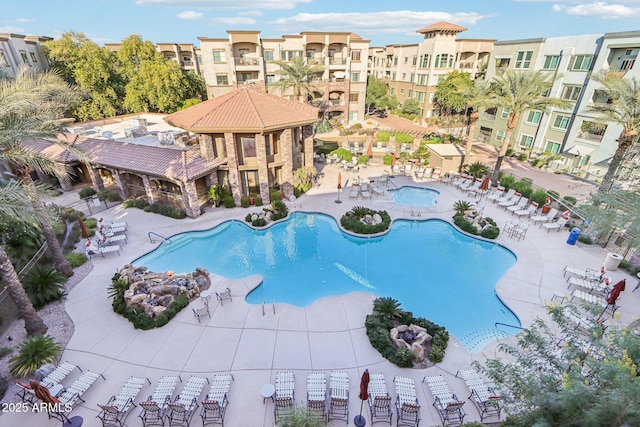 view of pool featuring a patio area