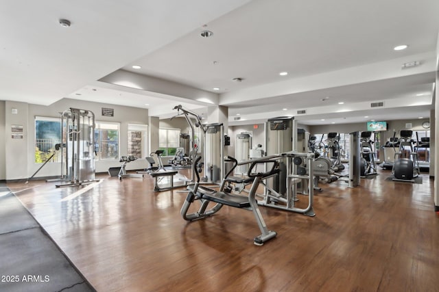 gym featuring hardwood / wood-style flooring