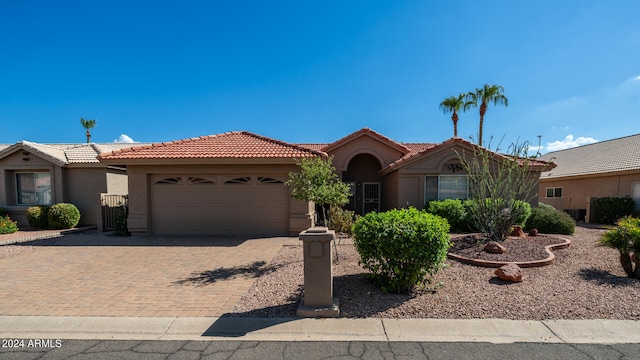 view of front of home with a garage