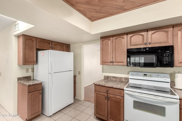 kitchen featuring light tile patterned floors, visible vents, white appliances, brown cabinetry, and wooden ceiling