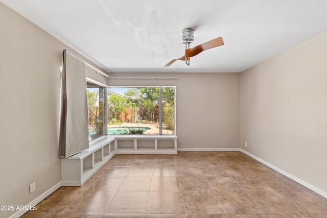 1749 W Monterosa St, Phoenix, AZ 85015 - empty room with a ceiling fan and baseboards