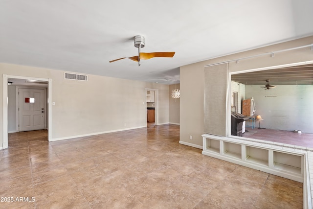 1749 W Monterosa St, Phoenix, AZ 85015 - unfurnished living room featuring ceiling fan