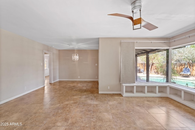 1749 W Monterosa St, Phoenix, AZ 85015 - empty room featuring a ceiling fan and light tile patterned floors