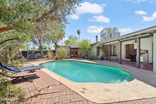 1749 W Monterosa St, Phoenix, AZ 85015 - view of pool featuring a patio area, area for grilling, and french doors