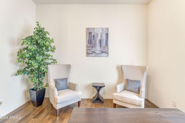 living area with wood-type flooring