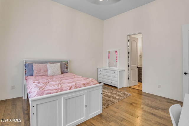 bedroom with light wood-type flooring