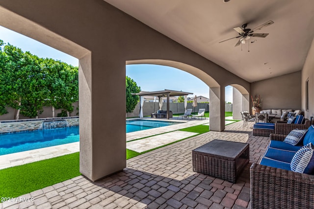 view of patio featuring an outdoor living space and ceiling fan