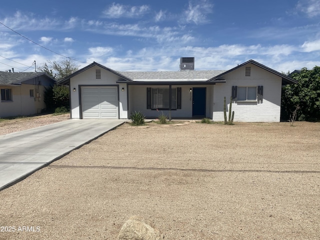 8120 W Varney Rd, Peoria, AZ 85345 - ranch-style house with covered porch, roof with shingles, an attached garage, concrete driveway, and a chimney
