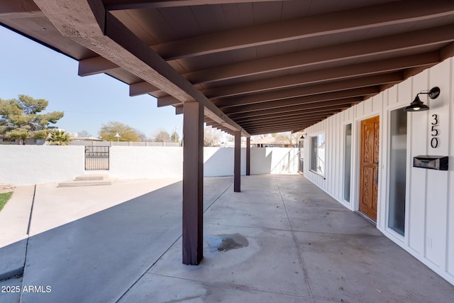 view of patio / terrace featuring fence