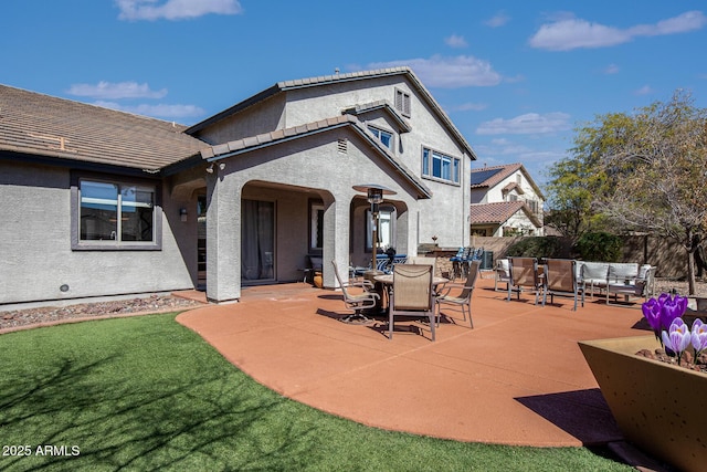 view of patio with an outdoor hangout area and fence