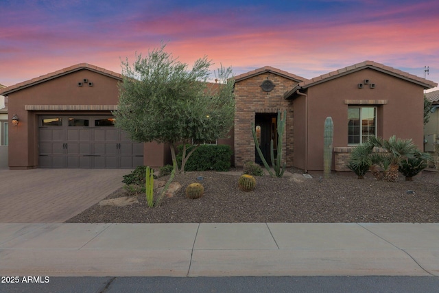 view of front of property featuring a garage