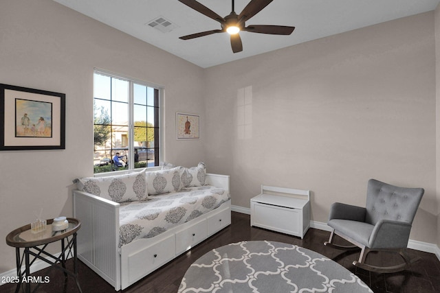 sitting room featuring ceiling fan and dark wood-type flooring