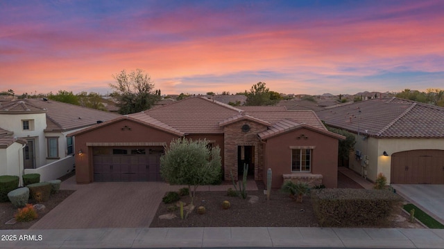 view of front of home featuring a garage