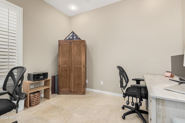 home office featuring baseboards