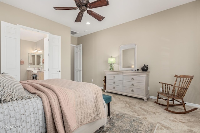 bedroom with light carpet, ensuite bathroom, visible vents, and baseboards