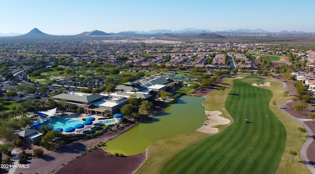 bird's eye view with golf course view, a residential view, and a water and mountain view