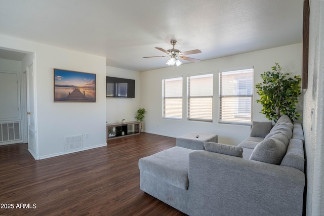 8516 N 64th Ave, Glendale, AZ 85302 - living area with ceiling fan, dark wood finished floors, and baseboards