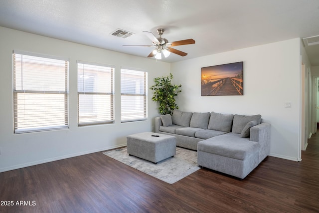 8516 N 64th Ave, Glendale, AZ 85302 - living room with wood finished floors, a ceiling fan, and baseboards