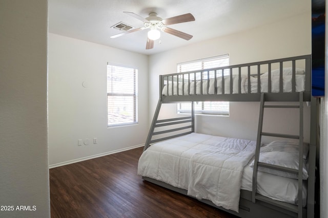 8516 N 64th Ave, Glendale, AZ 85302 - bedroom featuring wood finished floors, baseboards, and ceiling fan
