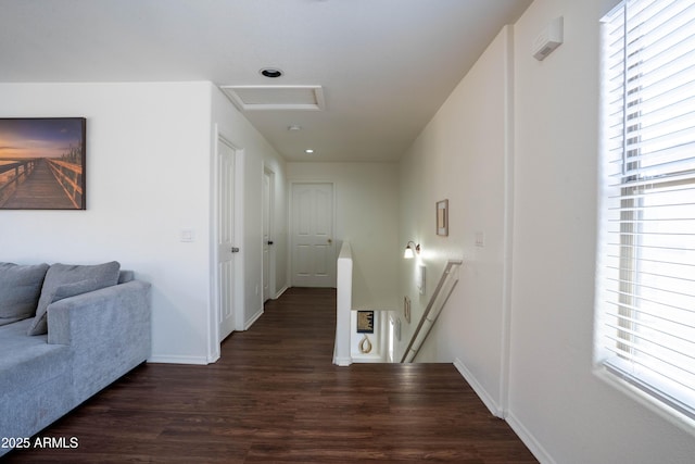 8516 N 64th Ave, Glendale, AZ 85302 - hallway with an upstairs landing, plenty of natural light, and dark wood-style flooring