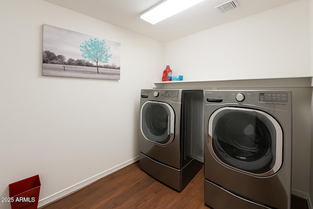 8516 N 64th Ave, Glendale, AZ 85302 - laundry room with independent washer and dryer, dark wood-style flooring, and baseboards