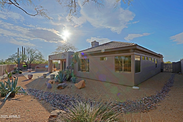 view of home's exterior featuring a patio area