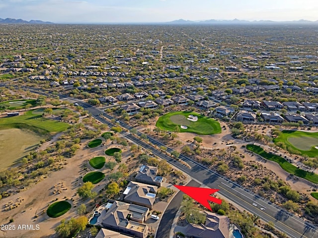 drone / aerial view featuring a mountain view