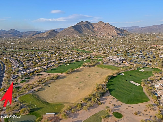 birds eye view of property featuring a mountain view