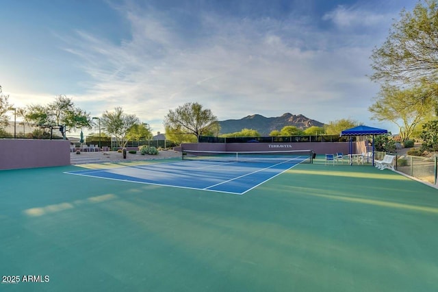 view of sport court with a mountain view