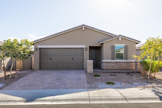 single story home with a garage