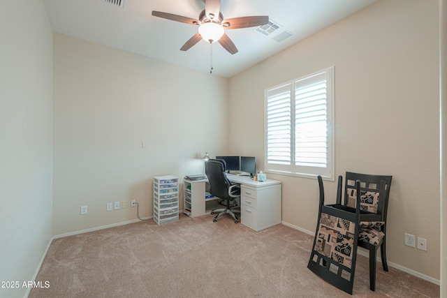 carpeted office with baseboards, a ceiling fan, and visible vents