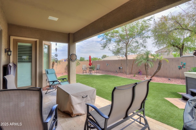 view of patio with a fenced backyard