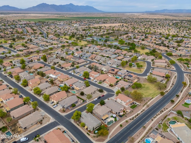birds eye view of property featuring a mountain view and a residential view