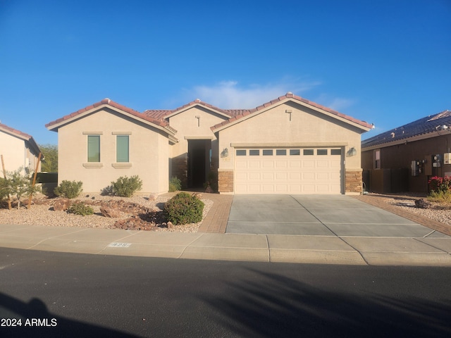 view of front of home featuring a garage