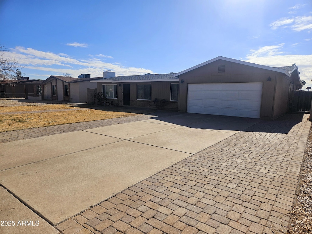 ranch-style house with a garage