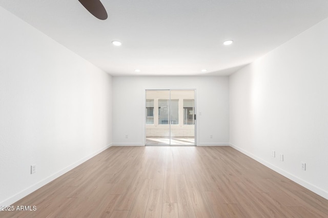 unfurnished room featuring light hardwood / wood-style flooring and ceiling fan