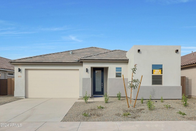 view of front of home with a garage