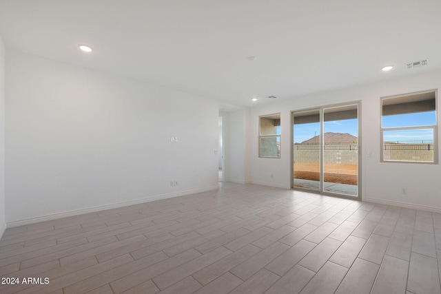 empty room with light wood-type flooring