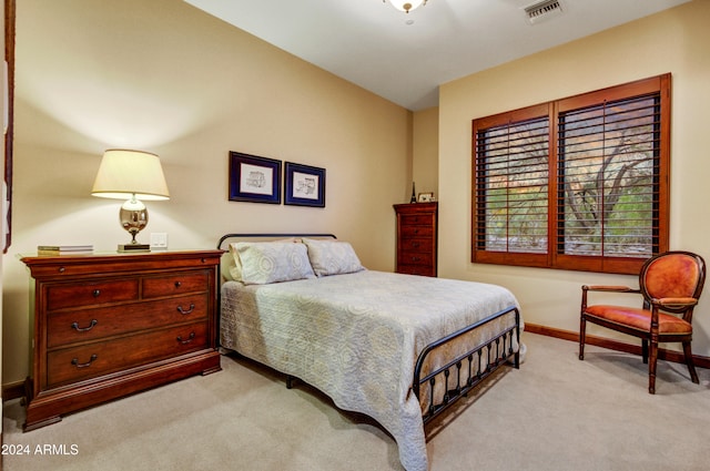 carpeted bedroom featuring lofted ceiling