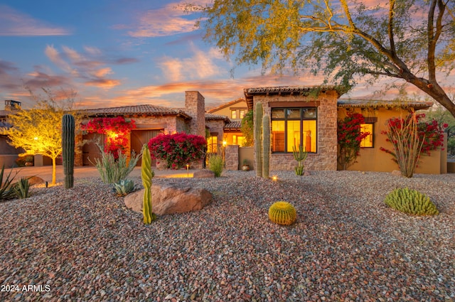 view of front of property with a garage