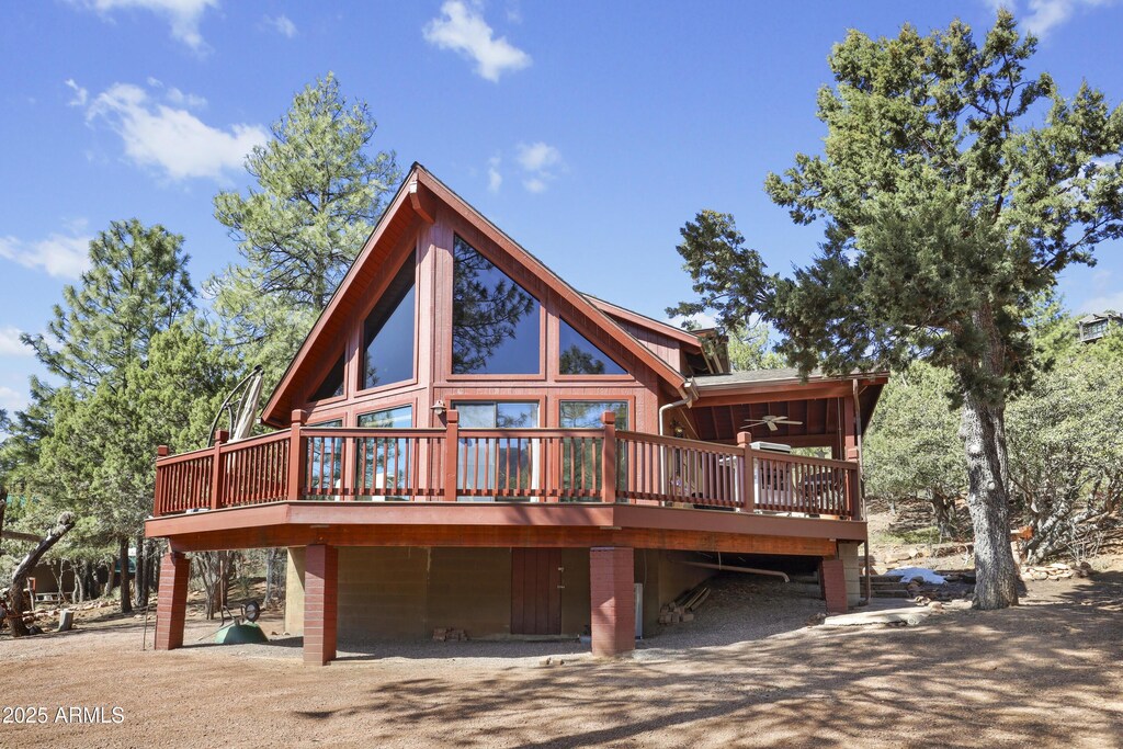 5869 E Arroyo Way, Pine, AZ 85544 - back of house with a wooden deck