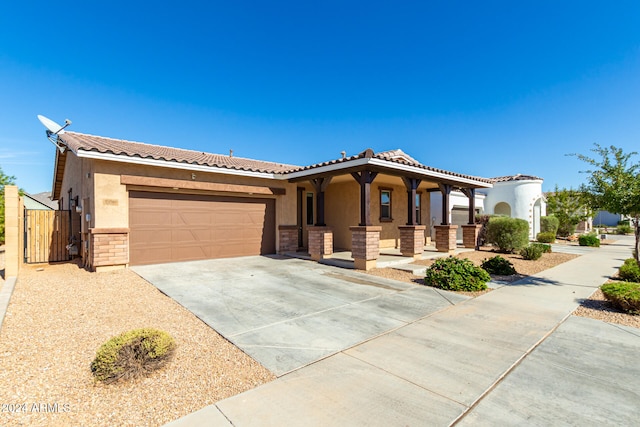 view of front of property with a garage