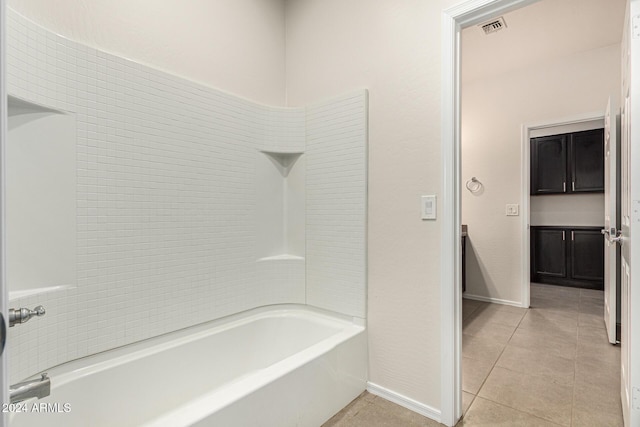 full bath with visible vents, shower / bathtub combination, baseboards, and tile patterned flooring