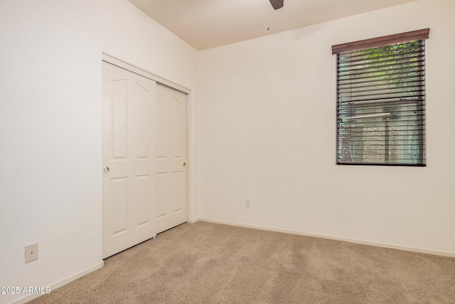 3622 E Sparrow Pl, Chandler, AZ 85286 - unfurnished bedroom featuring light carpet, a closet, and ceiling fan