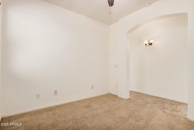 3622 E Sparrow Pl, Chandler, AZ 85286 - empty room with carpet, arched walkways, and ceiling fan