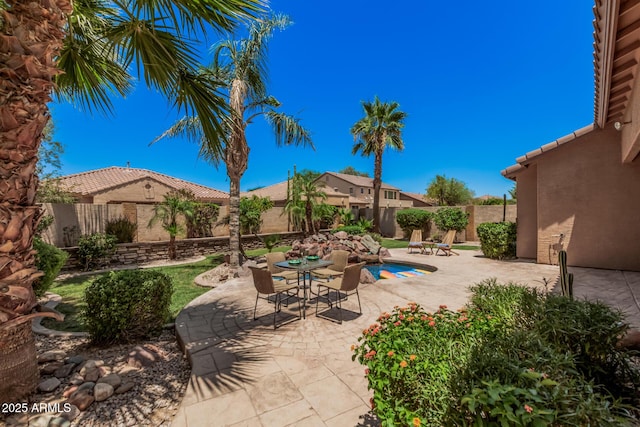 3622 E Sparrow Pl, Chandler, AZ 85286 - fenced backyard with a patio area