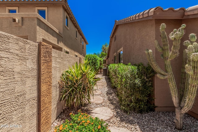 3622 E Sparrow Pl, Chandler, AZ 85286 - view of side of property with stucco siding and a central AC unit
