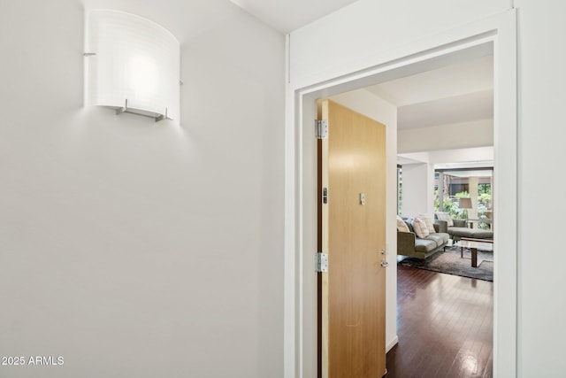 corridor featuring hardwood / wood-style floors