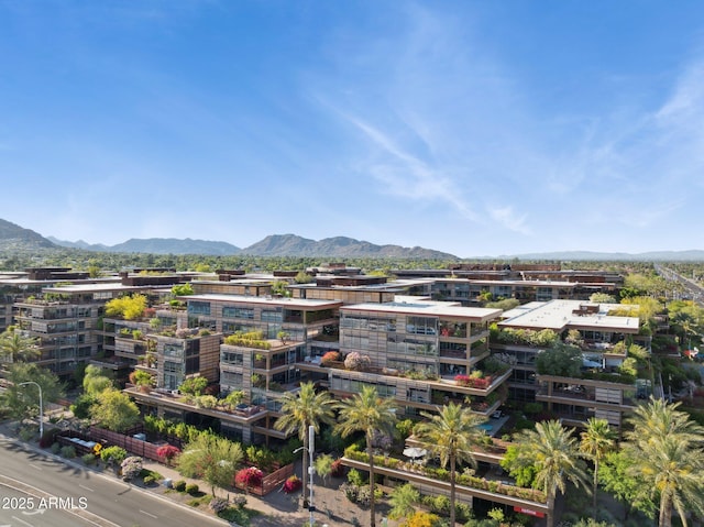 birds eye view of property featuring a mountain view